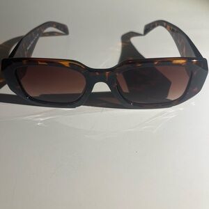 Prada Tortoise Shell Sunglasses
